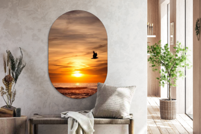 Muurovaal - Kunststof Wanddecoratie - Ovalen Schilderij - Rode Zonsondergang op Zee  - Zee - Horizon - Lucht - vogel - Ovale spiegel vorm op ku