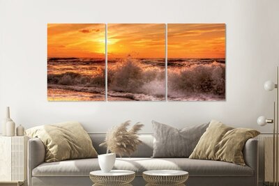 lienzo multipanel con una hermosa puesta de sol en el mar