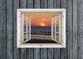 Tuinposter doorkijk met prachtie zonsondergang - strand - schip